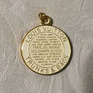 LV Gold and White from the Trunks Pendant Charm New Without Tags